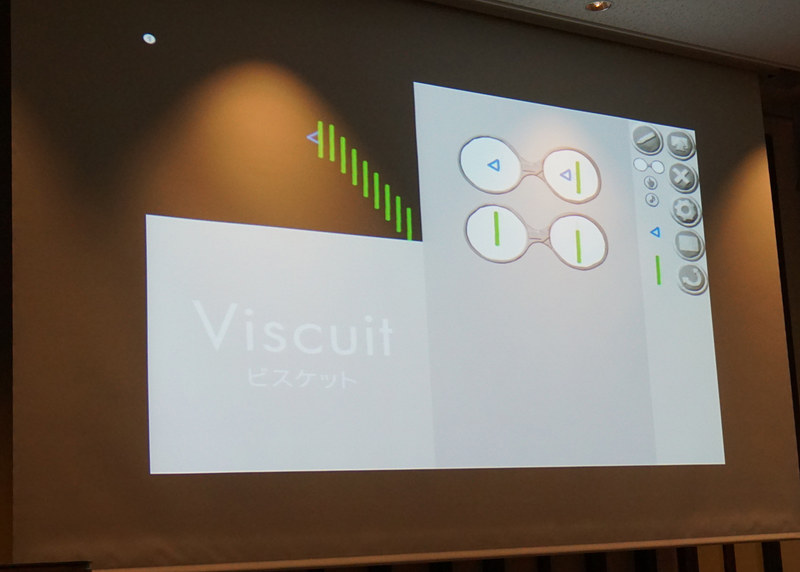 「うごくもよう」の題材。三角形が左に移動する度に緑の棒が追加され、その棒は下へ移動するプログラム。コンピュータが得意な繰り返しを使って、きれいな動く模様を作る