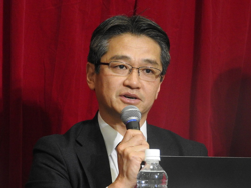 九州大学総務部長、前・文科省情報教育振興室長の新津勝二